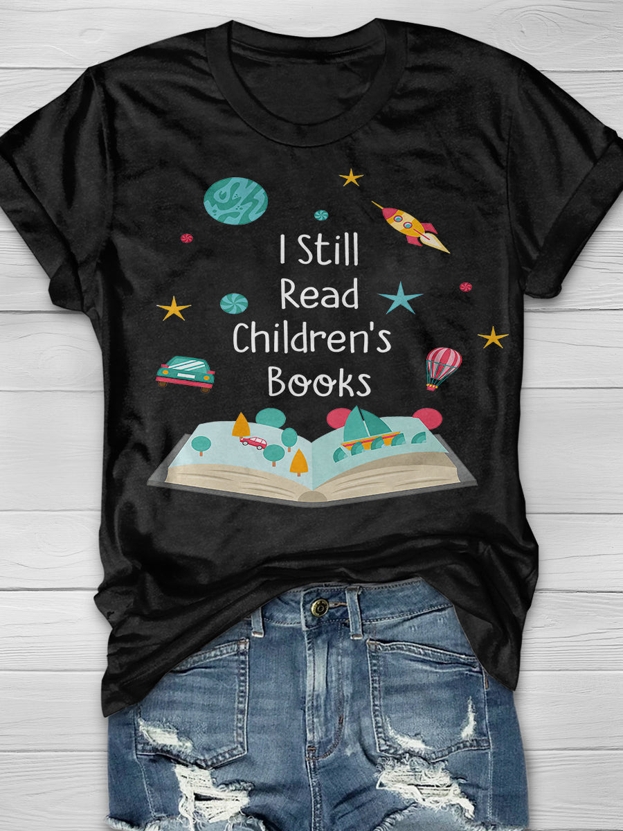 I Still Read Children's Books Teacher Print Graphic T-shirts
