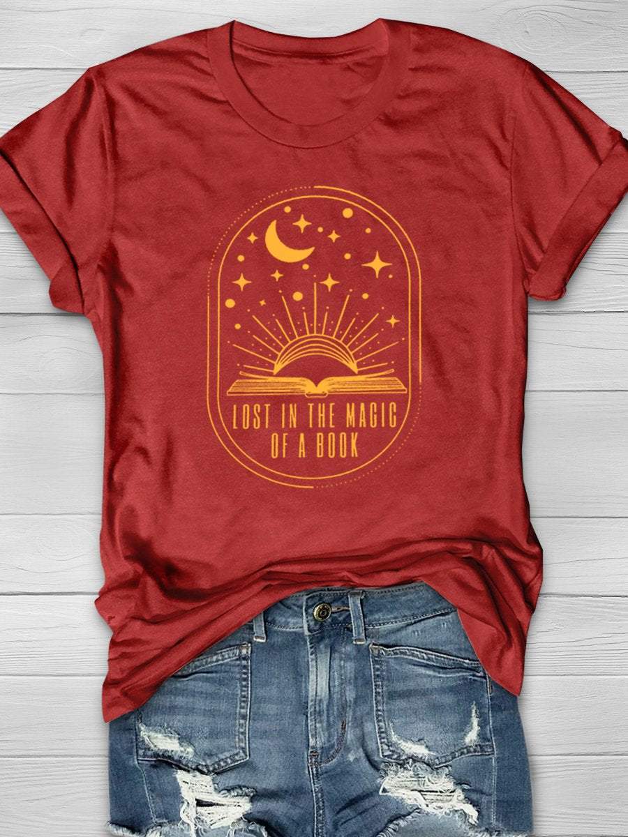 Lost In The Magic Of A Book Print Graphic T-shirts