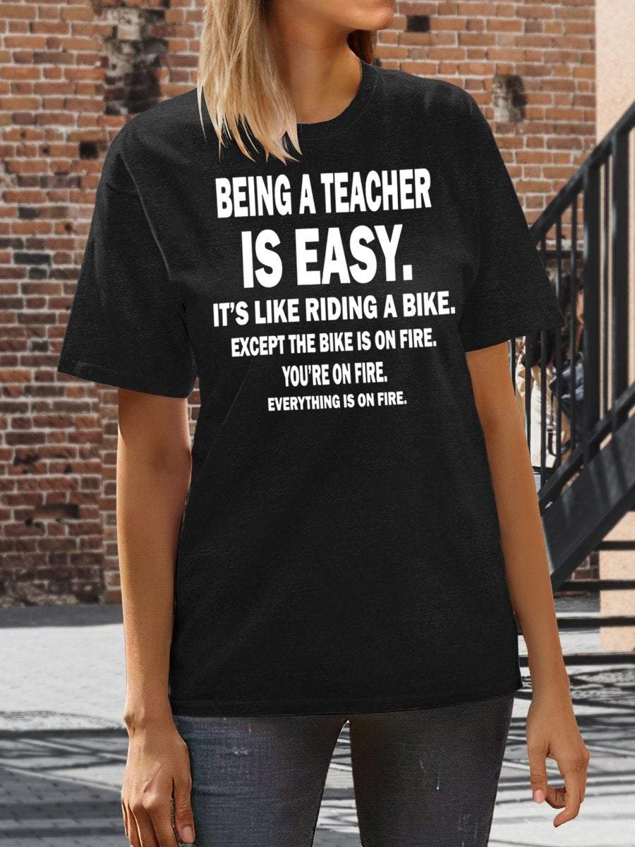 Being A Teacher Is Easy It's Like Riding A Bike Except The Bike Is On Fire Everything Is On Fire Print Graphic T-shirts