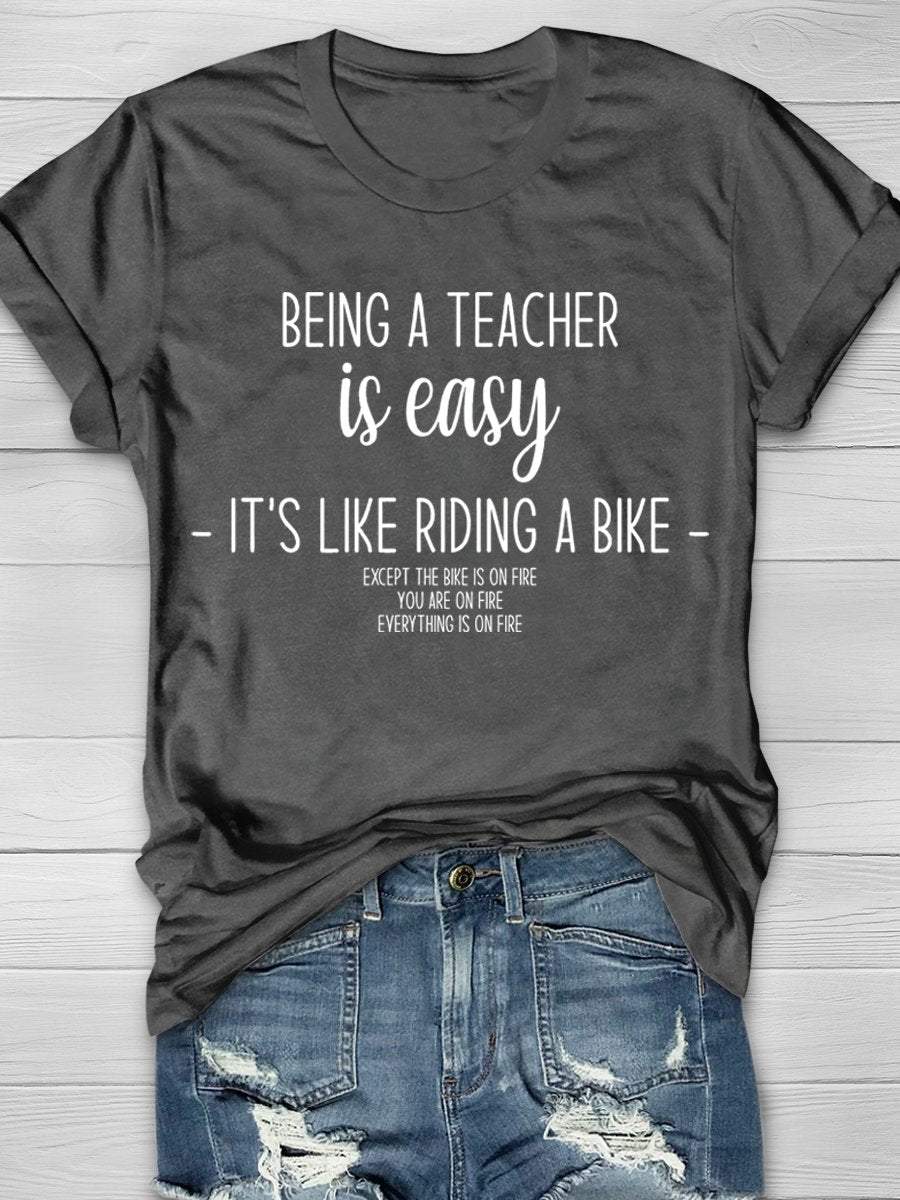 Being A Teacher Is Easy It's Like Riding A Bike Print Graphic T-shirts